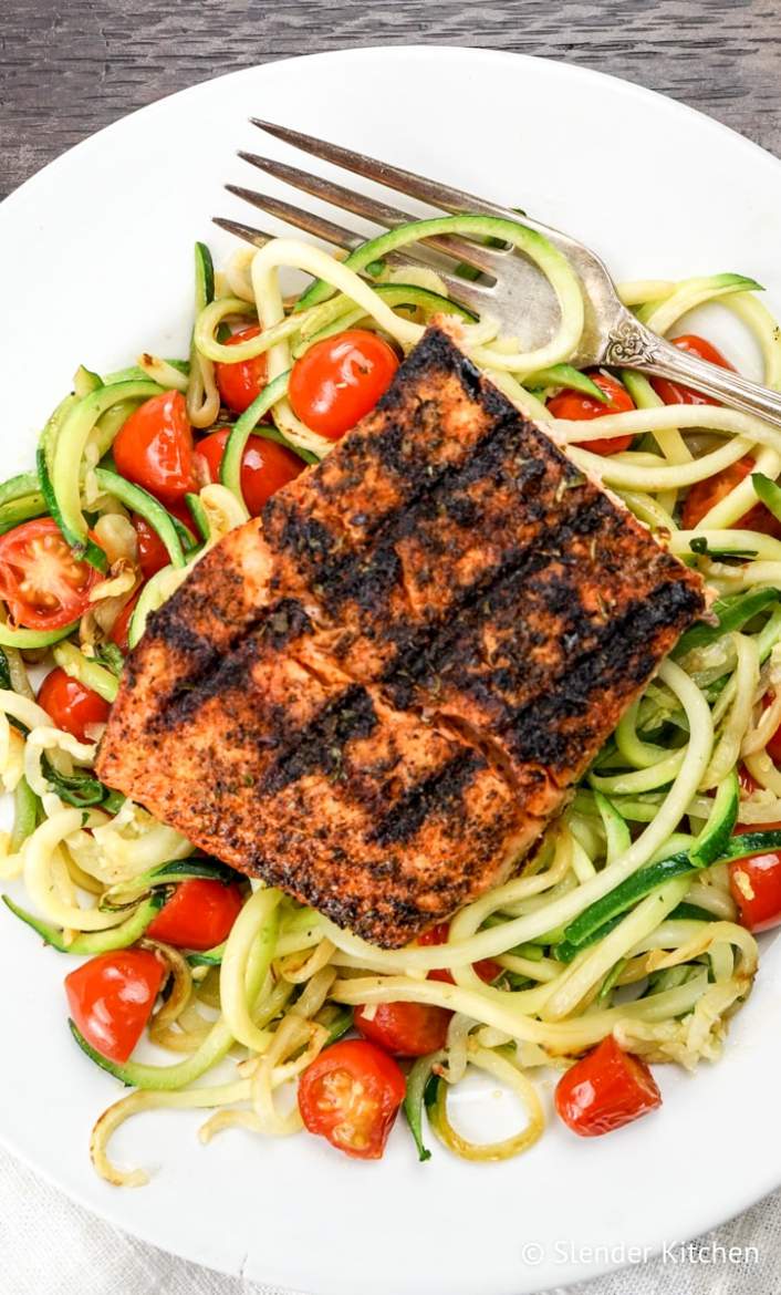 Blackened Salmon with Garlic Zucchini Noodles with an antique fork.