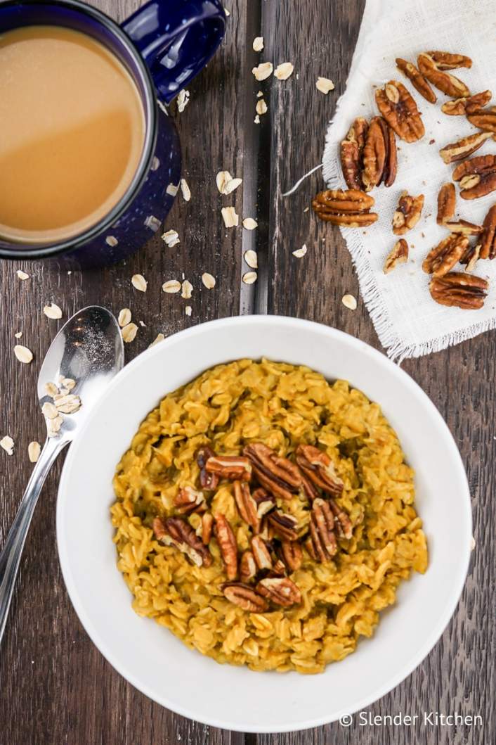 Pumpkin Pie Oatmeal served with coffee and pecans.