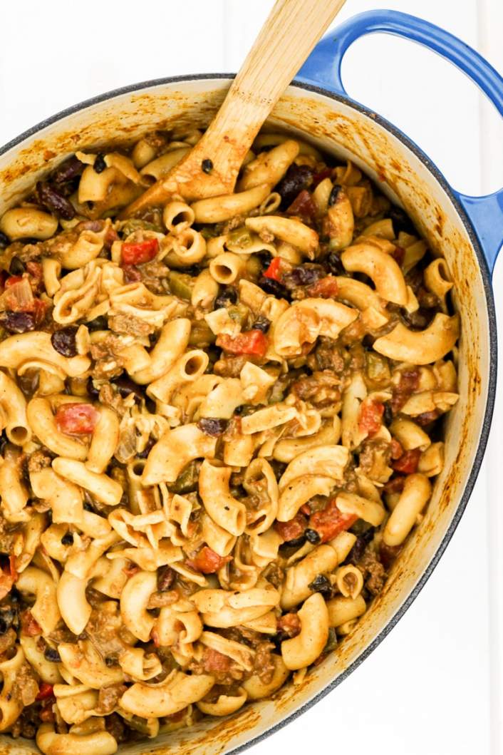 One Pot Easy Chili Mac with pasta, beans, and peppers in a large pot.
