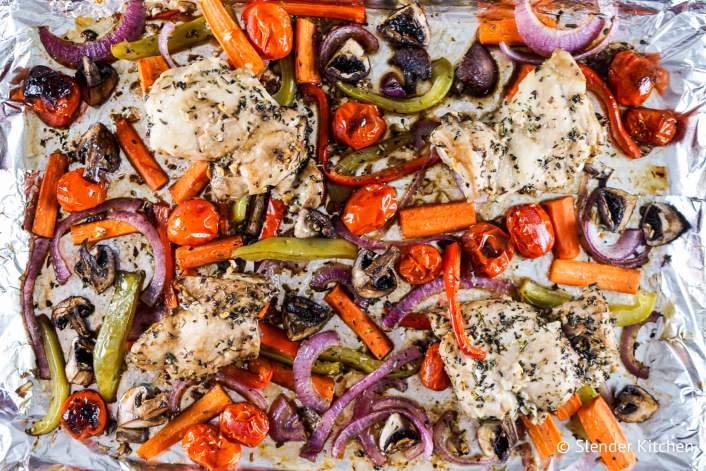 Roasted Balsamic Chicken and Vegetables in a foil lined baking sheet.