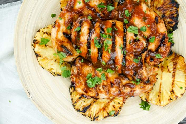 Grilled Pineapple Barbecue Chicken on a plate with cilantro.