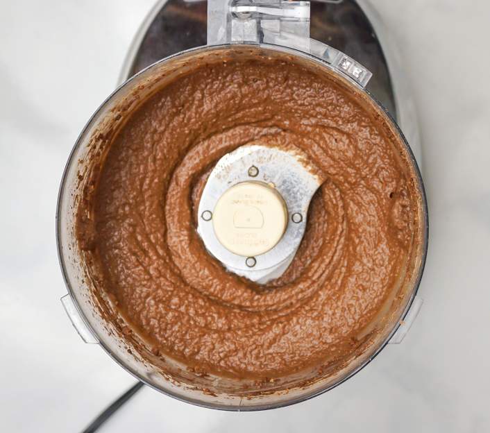 Brownie Batter Chocolate Hummus in a food processor.